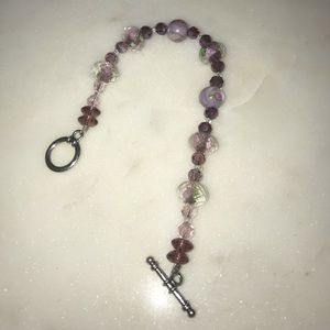 super cute handmade purple flower bracelet